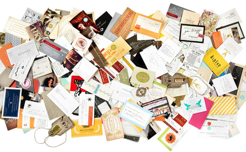 Pile of business cards designed by Erik Kass.
